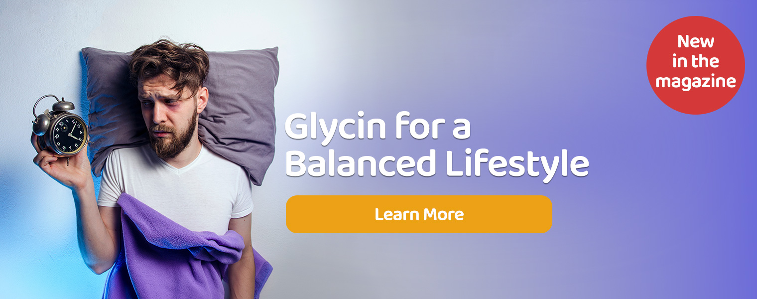 Man lying awake in bed holding alarm clock beside glycine headline – cool nighttime lighting, exhausted and restless mood